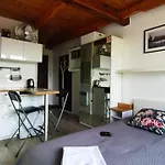 Yellow Peaked Shoe Apartment