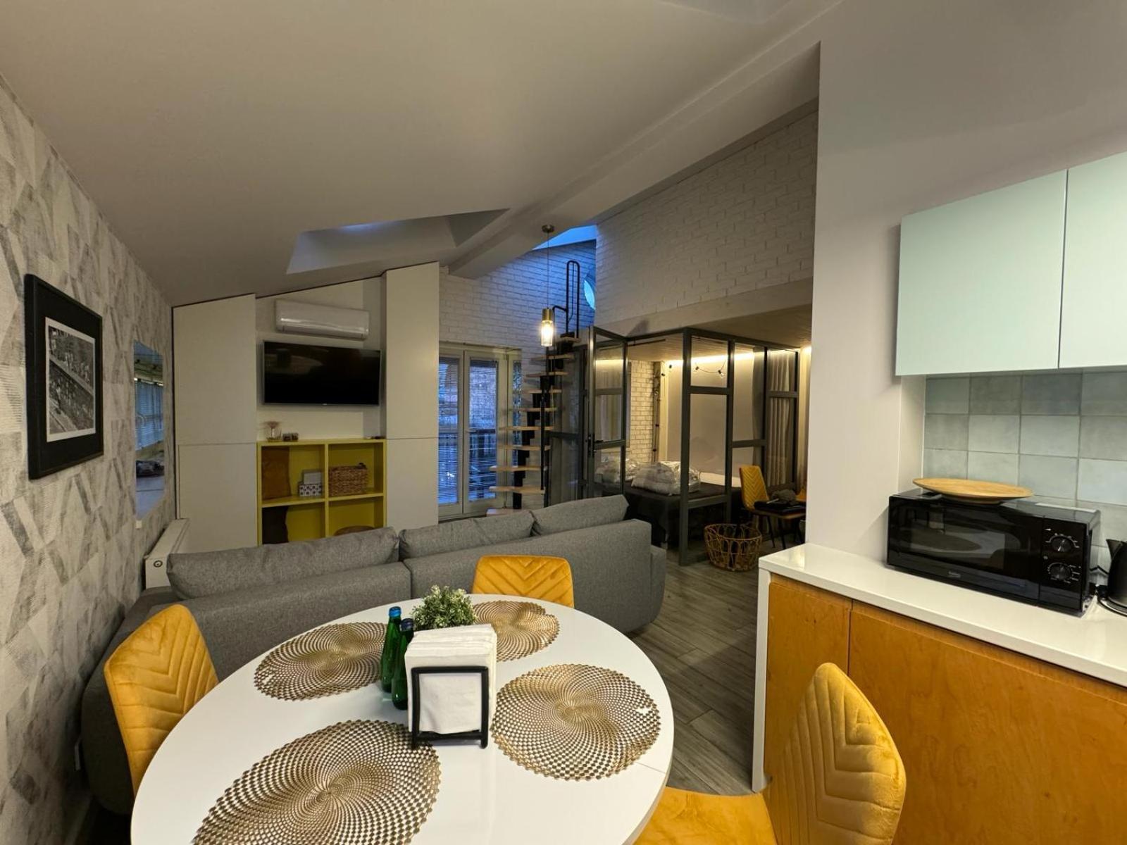 Balcony Bliss Main Square Loft Apartment